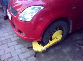 Govt mandates cashless parking, wheel-clamping under new rules