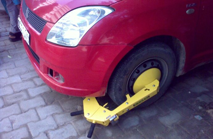 Govt mandates cashless parking, wheel-clamping under new rules