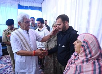 LG Sinha visits family of slain policeman